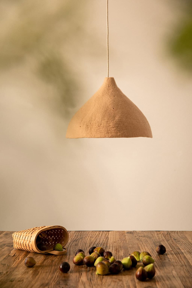 Large perforated felt shade: a pendant light for the dining room