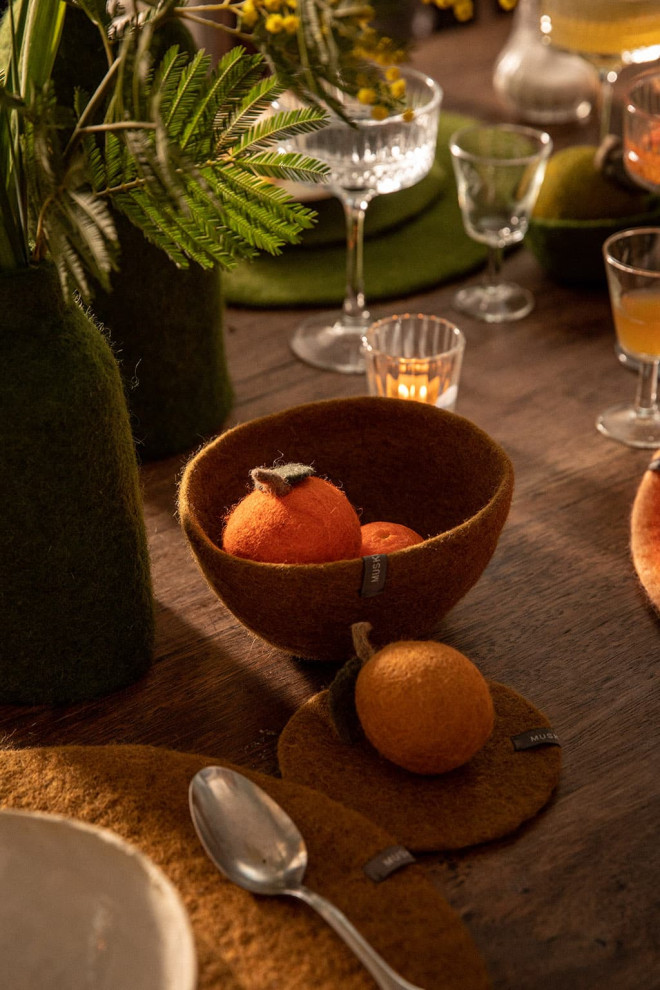 Trio of beige wool felt placemats