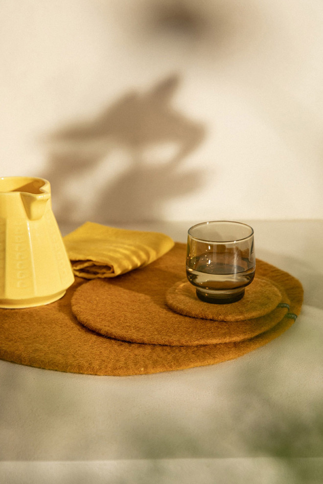 Trio of beige wool felt placemats