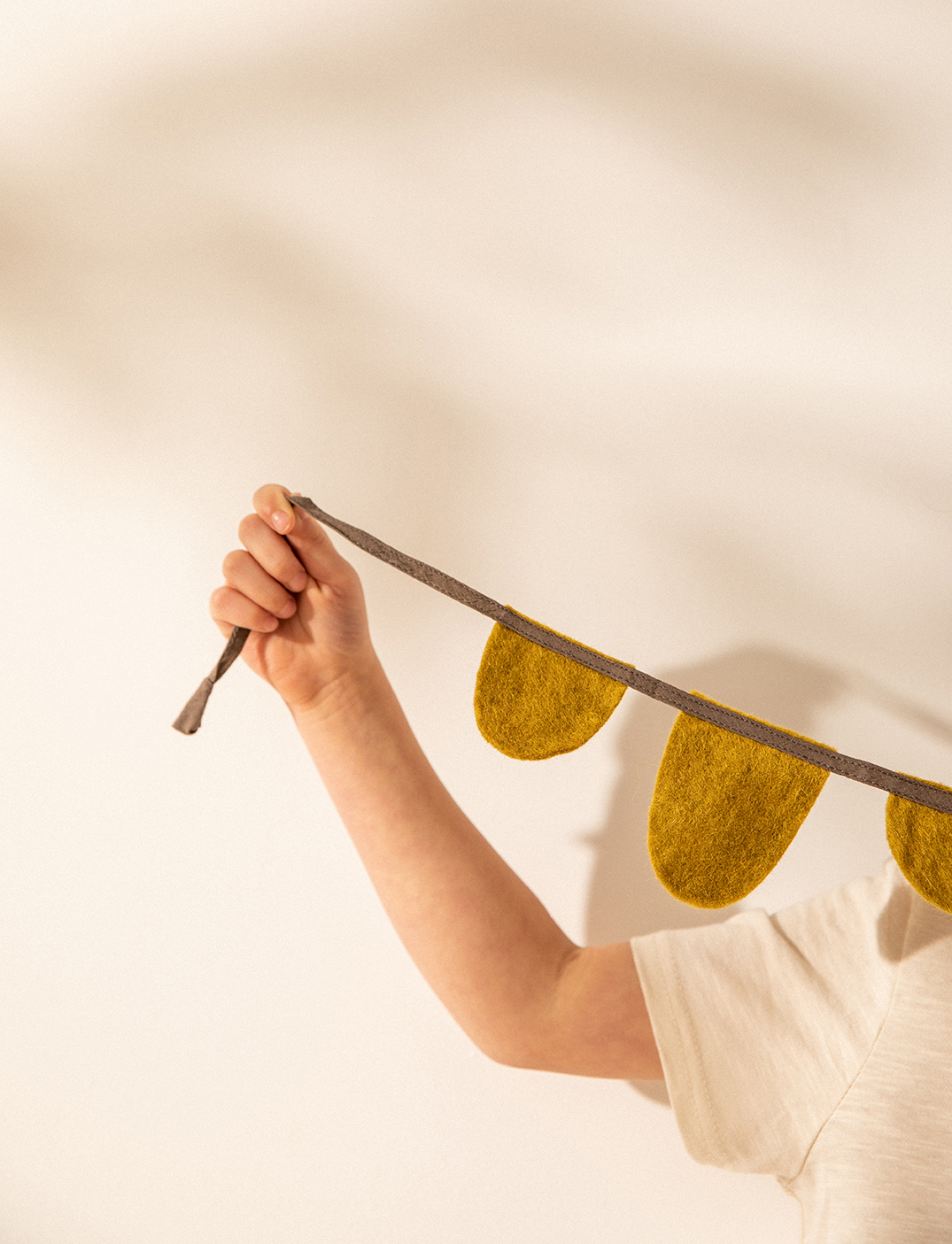 Felt and cotton decorative pennant garland for the nursery