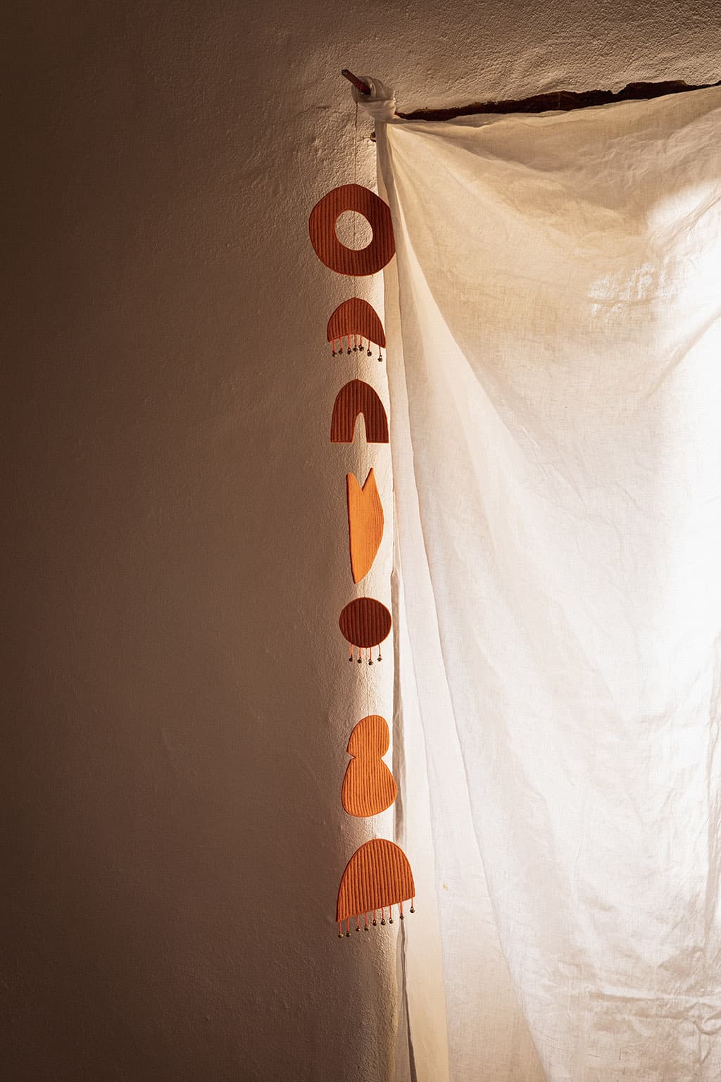 Orange Chakra decorative mobile in felt for a serene decor