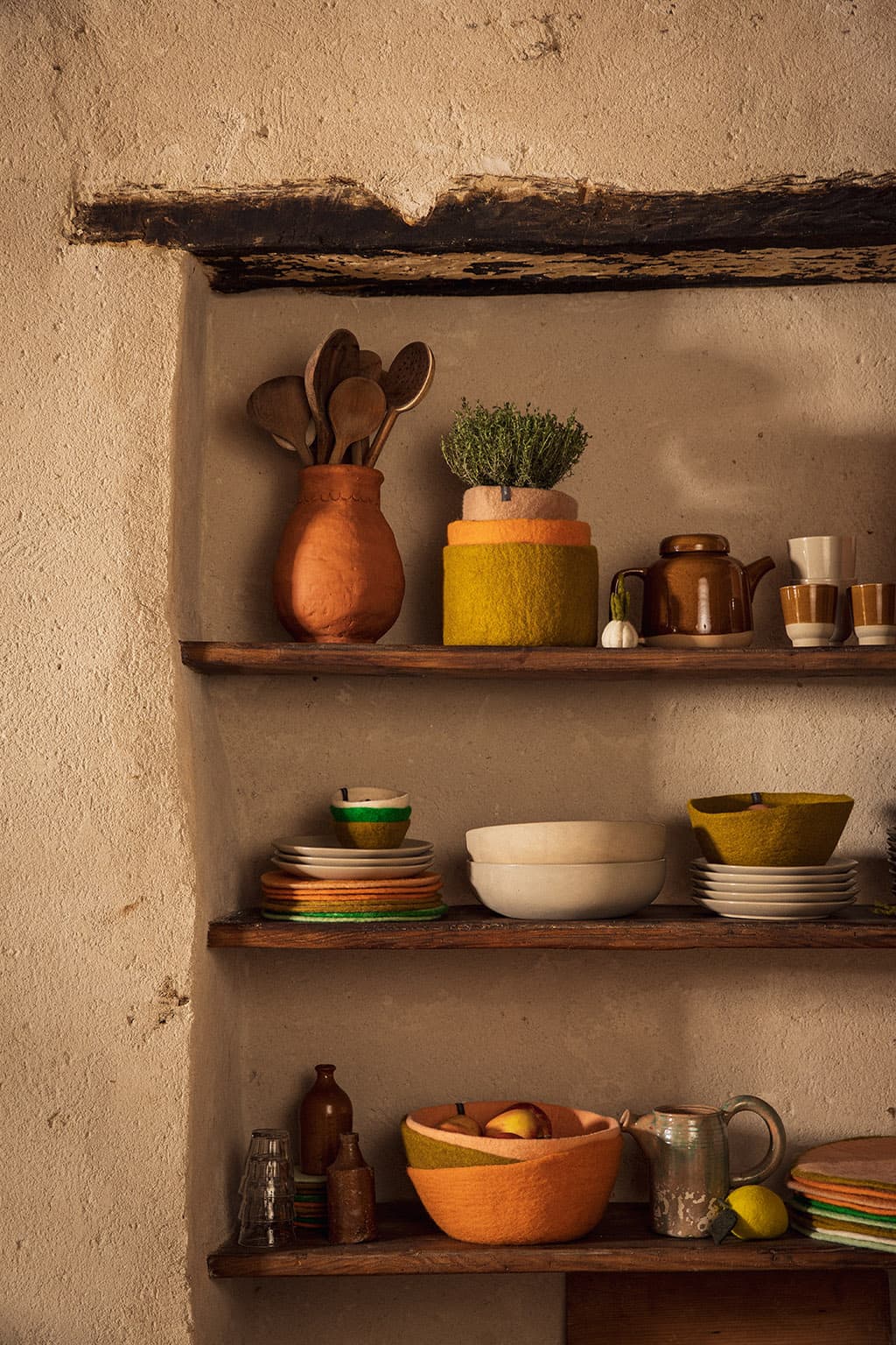 Decorative felt accessories on a shelf