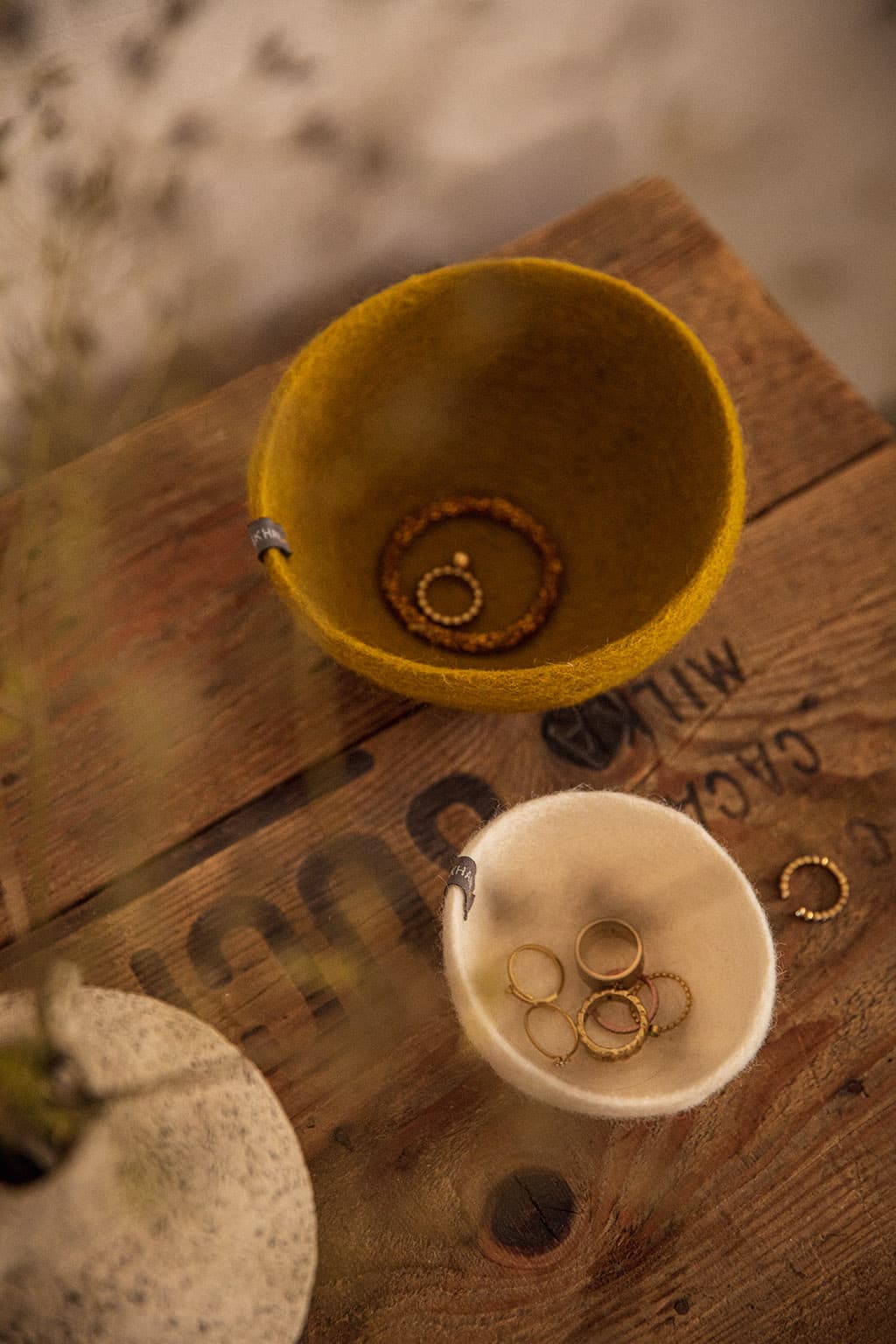 Small white and green wool catch-all bowls for storing jewelry