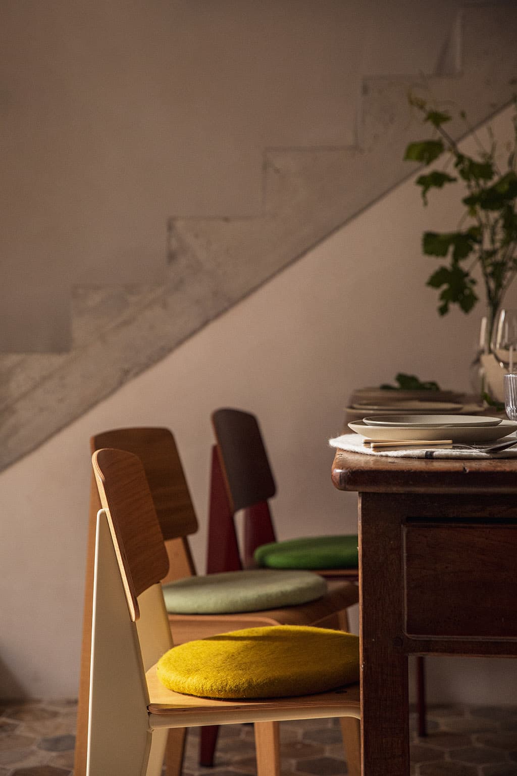 Round felted wool chair pads for the dining room