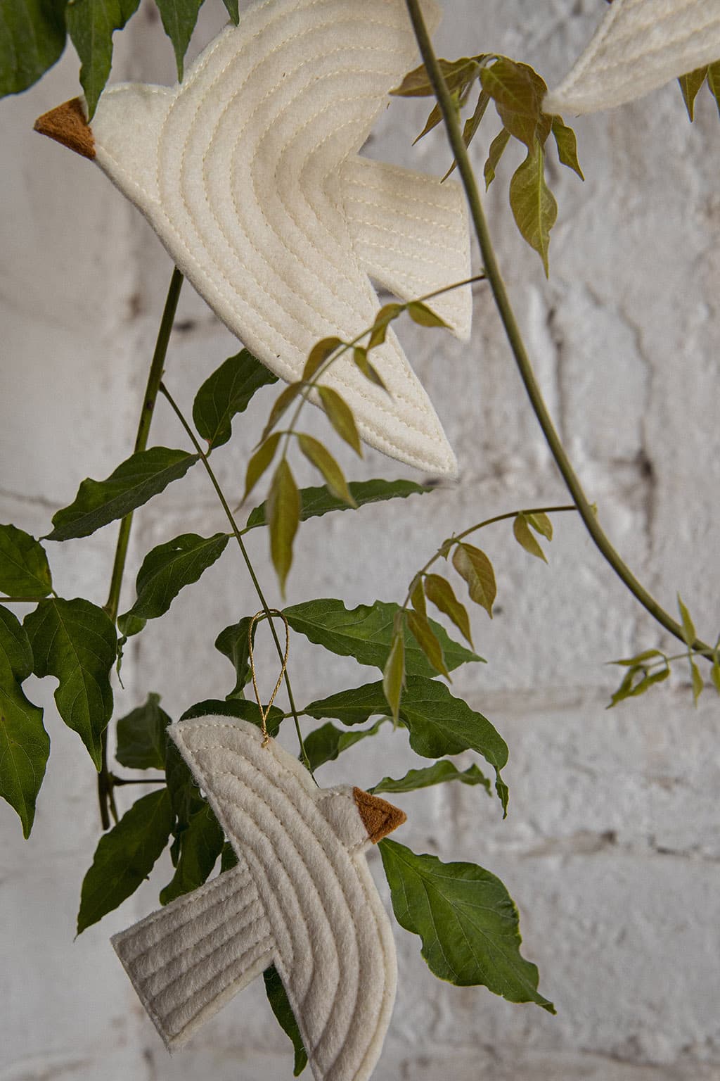 White decorative wool birds to hang